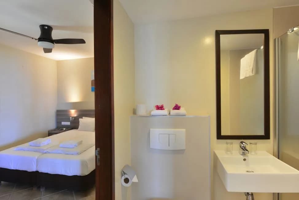 A bathroom in a suite at Lions Dive & Beach Resort Curaçao. A bathroom in a suite at Lions Dive & Beach Resort Curaçao.