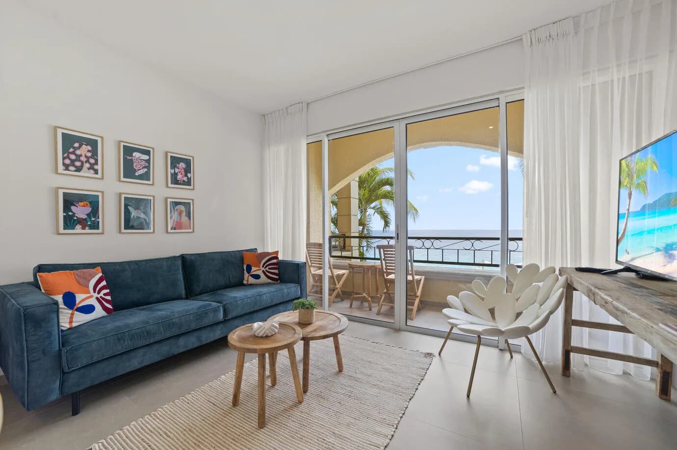 Living area with large windows in the Junior Suite Living area with large windows in the Junior Suite
