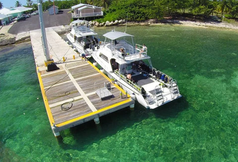 Two dive boats moored to the jetty at Cayman Brac Beach Resort 3 Two dive boats moored to the jetty at Cayman Brac Beach Resort 3
